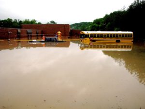 2010 rains, flood waters submerged a Cheatham County school bus, vehicles, and Kingston Springs Elementary School