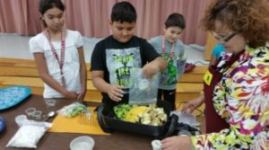 kids making a salad